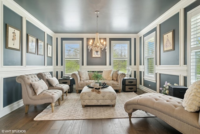 32 E Peter Ln, Hawthorn Woods, IL 60047 - living room with a decorative wall, a chandelier, plenty of natural light, hardwood / wood-style floors, and ornamental molding