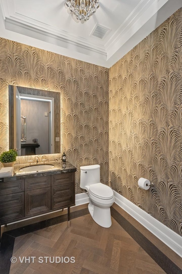435 N Michigan Ave Unit 401, Chicago, IL 60611 - half bathroom featuring wallpapered walls, vanity, baseboards, toilet, and visible vents