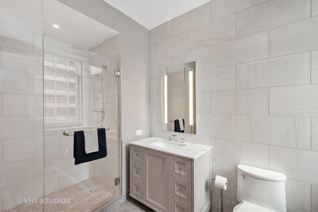 435 N Michigan Ave Unit 401, Chicago, IL 60611 - full bath with vanity, toilet, and a stall shower