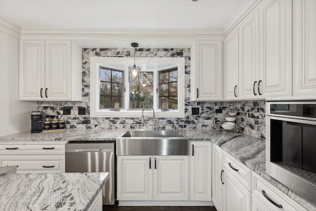 7267 Southwick Dr, Frankfort, IL 60423 - kitchen featuring decorative backsplash, a sink, white cabinetry, and appliances with stainless steel finishes