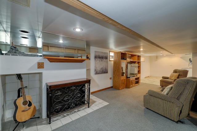 carpeted living room featuring baseboards, recessed lighting, and tile patterned flooring