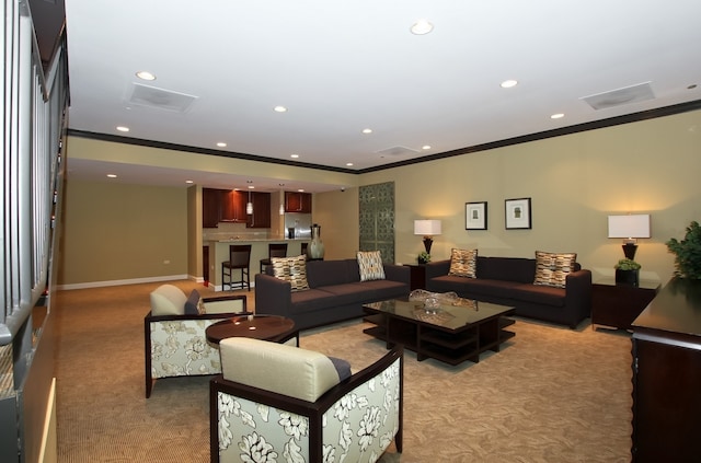 living room with light carpet, ornamental molding, recessed lighting, and baseboards