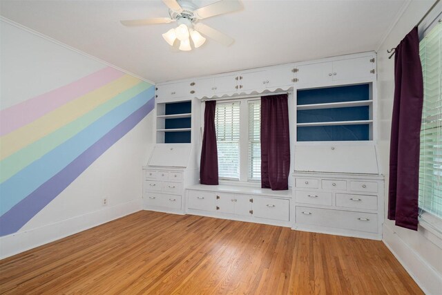316 E Pierce St, Pontiac, IL 61764 - unfurnished bedroom with baseboards, light wood-style flooring, ornamental molding, and a ceiling fan