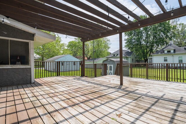 316 E Pierce St, Pontiac, IL 61764 - wooden deck with a lawn and a pergola