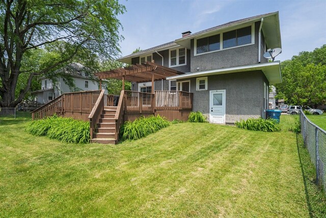316 E Pierce St, Pontiac, IL 61764 - back of property featuring a pergola, a wooden deck, stucco siding, stairs, and a chimney