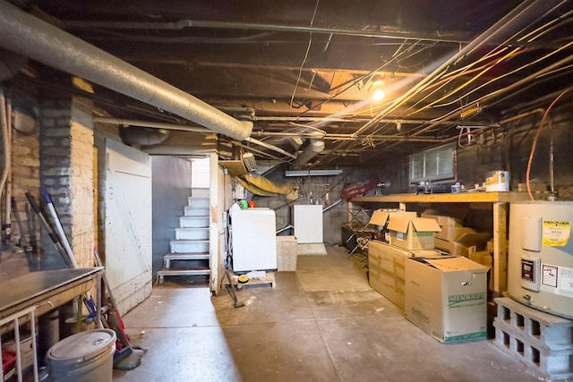 316 E Pierce St, Pontiac, IL 61764 - unfinished below grade area featuring washing machine and dryer, electric water heater, and stairway