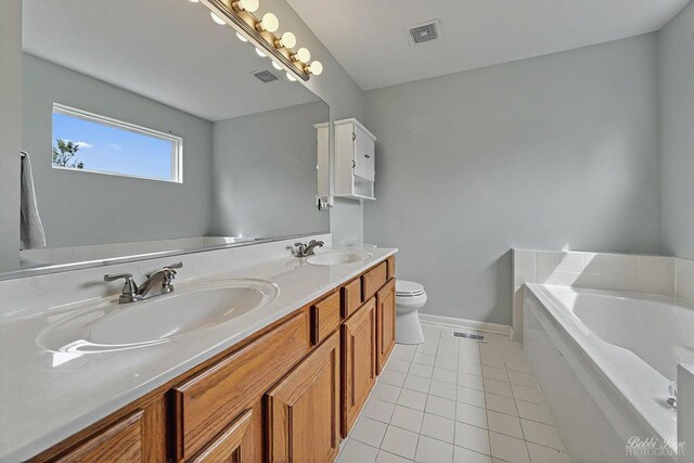 bathroom with a sink, tile patterned floors, and visible vents