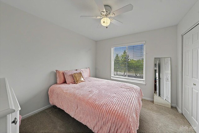 bedroom featuring baseboards, light carpet, and ceiling fan