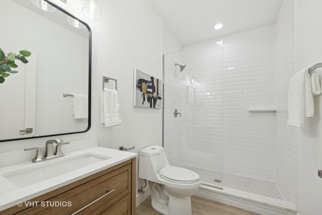 534 S Harvey Ave, Oak Park, IL 60304 - full bath with tiled shower, toilet, vanity, recessed lighting, and wood finished floors