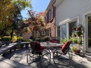 deck with outdoor dining space