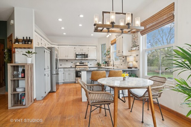 23114 W N Lakewood Ln, Lake Zurich, IL 60047 - dining area featuring light wood-style floors and recessed lighting