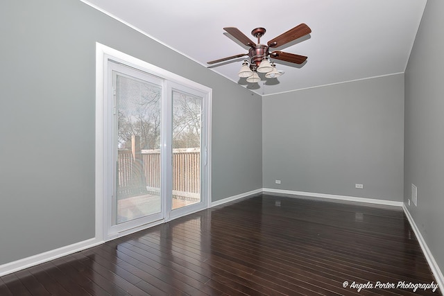 unfurnished room featuring baseboards, a ceiling fan, and dark wood-style flooring