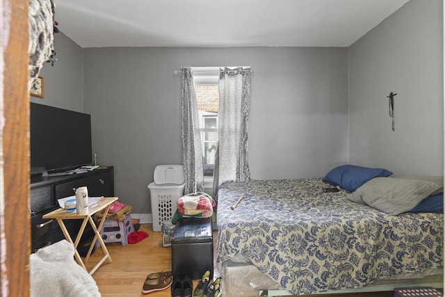 bedroom featuring wood finished floors