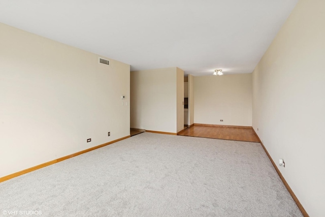 898 Wellington Ave Unit 310, Elk Grove Village, IL 60007 - carpeted empty room with baseboards
