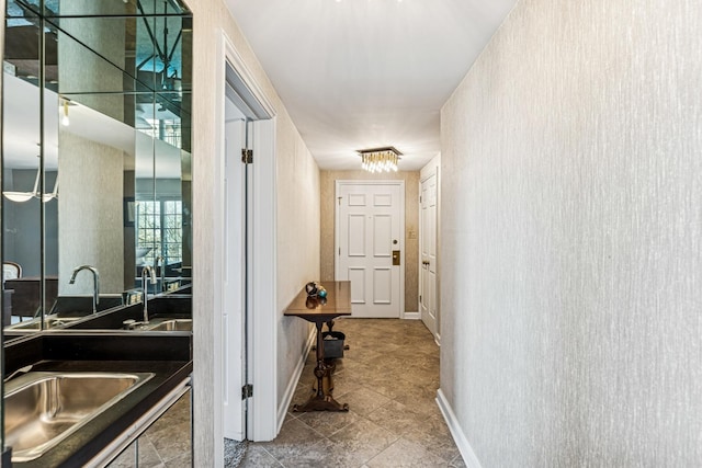 corridor with baseboards