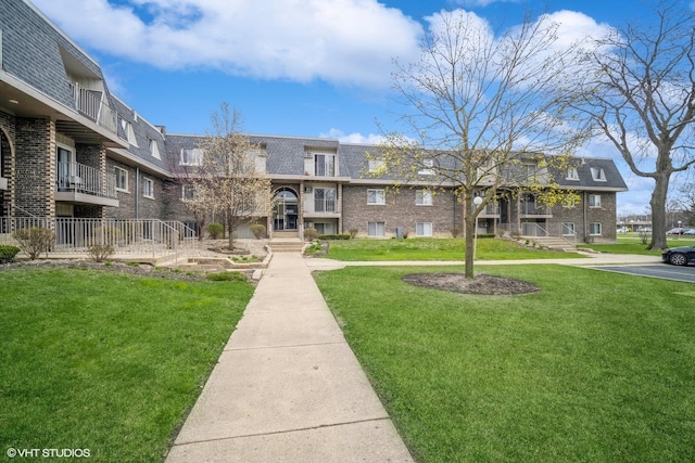 surrounding community featuring a yard