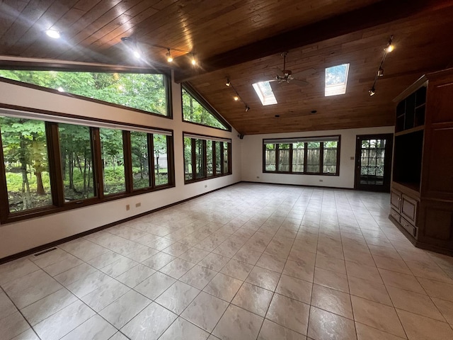 809 Overlook Dr, Frankfort, IL 60423 - unfurnished room with a skylight, track lighting, wood ceiling, light tile patterned floors, and high vaulted ceiling