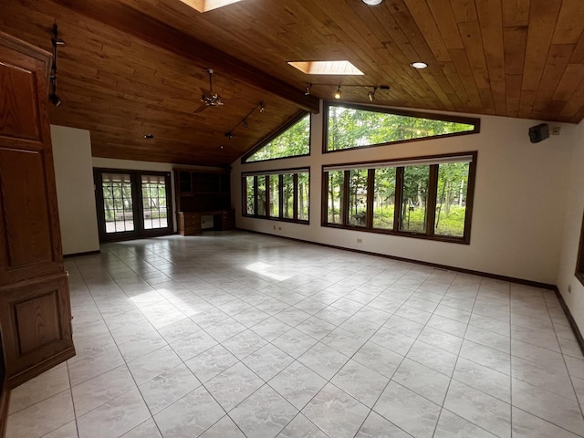 809 Overlook Dr, Frankfort, IL 60423 - unfurnished living room featuring wooden ceiling, lofted ceiling, light tile patterned floors, track lighting, and a skylight