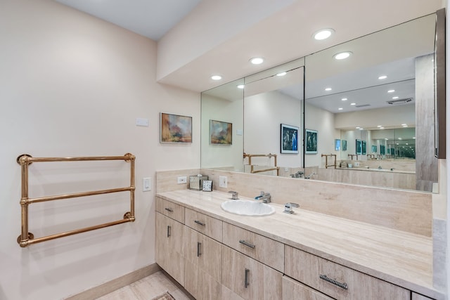 180 E Pearson St Unit 4503, Chicago, IL 60611 - bathroom featuring visible vents, baseboards, recessed lighting, and vanity