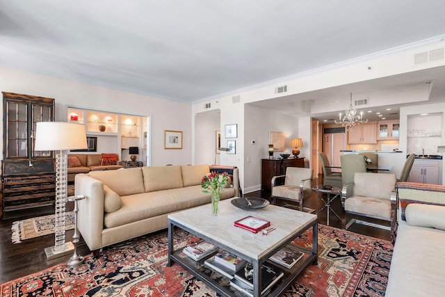 180 E Pearson St Unit 4503, Chicago, IL 60611 - living room featuring wood finished floors, visible vents, crown molding, and a notable chandelier