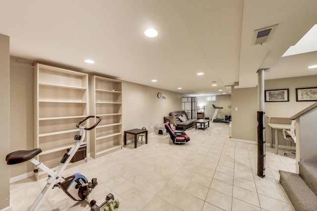 exercise room featuring baseboards, visible vents, and recessed lighting