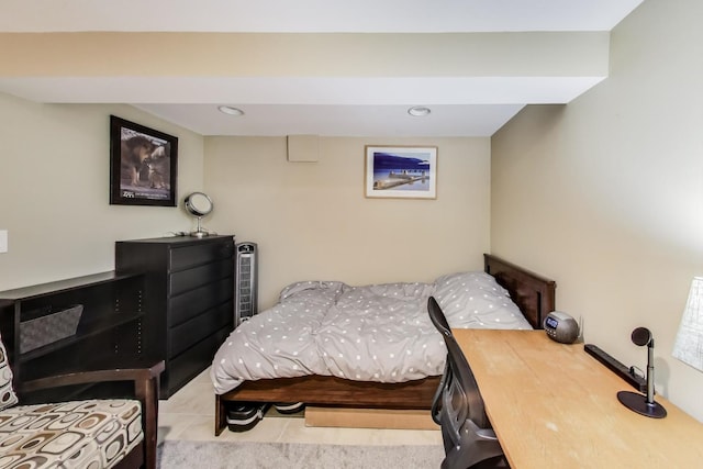 tiled bedroom with recessed lighting