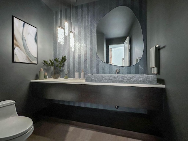 bathroom with vanity and toilet