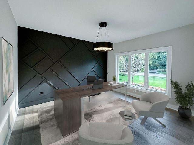 home office with wood finished floors and baseboards
