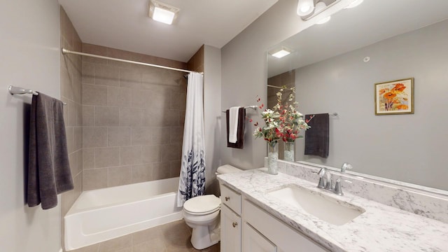 bathroom featuring shower / tub combo, toilet, vanity, and tile patterned floors