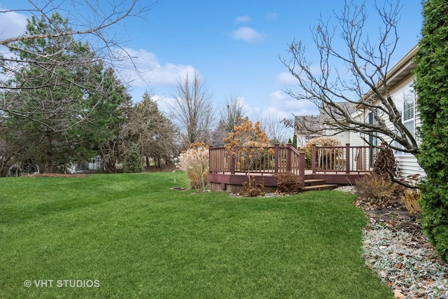 view of yard with a deck