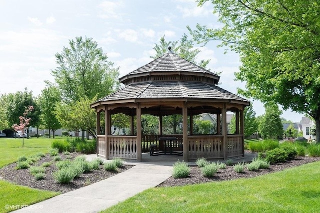 view of property's community featuring a lawn and a gazebo
