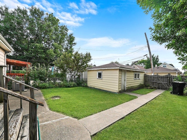 2758 N Newcastle Ave, Chicago, IL 60707 - view of yard featuring a fenced backyard and an outbuilding