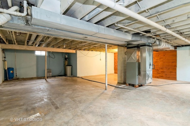 below grade area featuring heating unit