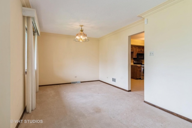unfurnished room featuring crown molding, visible vents, and light carpet