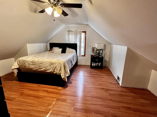 7971 S Kostner Ave, Chicago, IL 60652 - bedroom with radiator, visible vents, lofted ceiling, wood finished floors, and ceiling fan