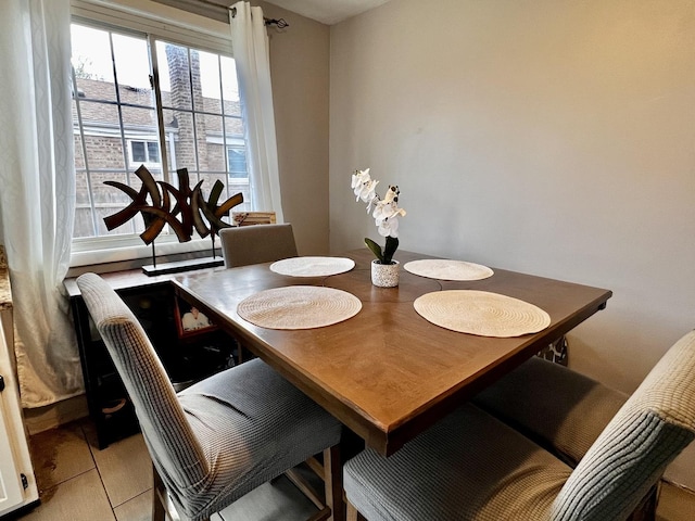 7971 S Kostner Ave, Chicago, IL 60652 - dining area featuring light tile patterned floors