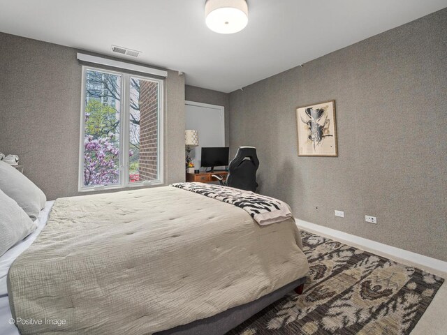 1343 N Sutton Pl, Chicago, IL 60610 - carpeted bedroom with baseboards