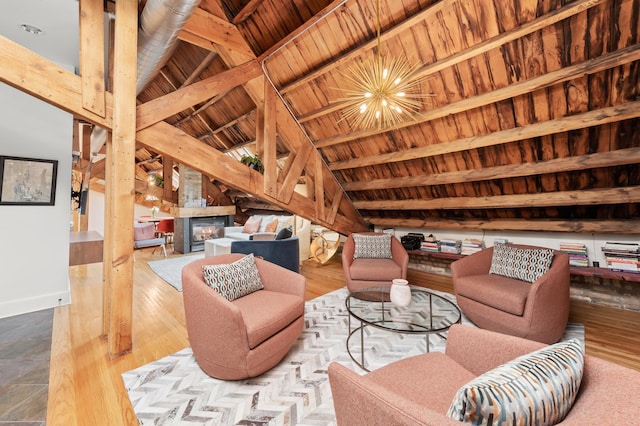 1547 N Leavitt St Unit 3S, Chicago, IL 60622 - living room with a glass covered fireplace, wood ceiling, and lofted ceiling with beams