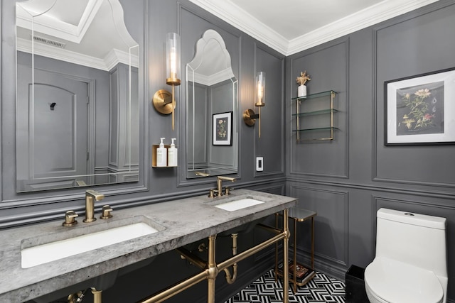 1547 N Leavitt St Unit 3S, Chicago, IL 60622 - bathroom featuring a decorative wall, toilet, and a sink
