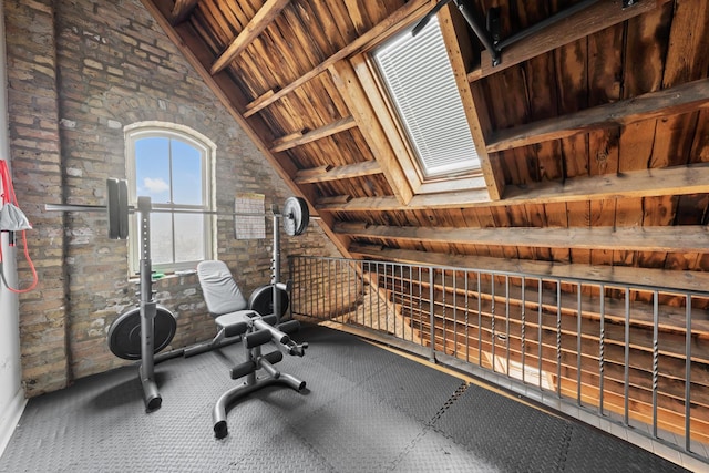 1547 N Leavitt St Unit 3S, Chicago, IL 60622 - exercise area with wood ceiling and brick wall
