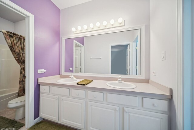 5632 Fairview Ave, Downers Grove, IL 60516 - bathroom with toilet, double vanity, and shower / bathtub combination with curtain