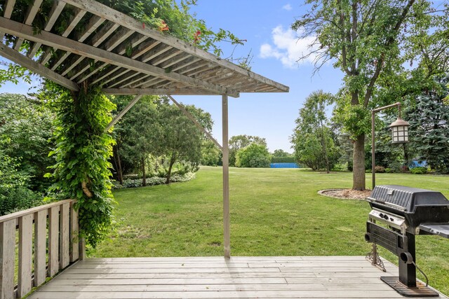 5632 Fairview Ave, Downers Grove, IL 60516 - wooden terrace with a lawn, a grill, and a water view