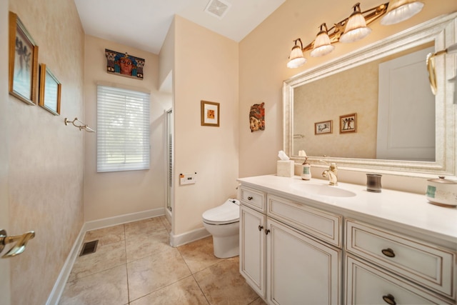 5632 Fairview Ave, Downers Grove, IL 60516 - bathroom with toilet, a shower with shower door, vanity, baseboards, and tile patterned floors