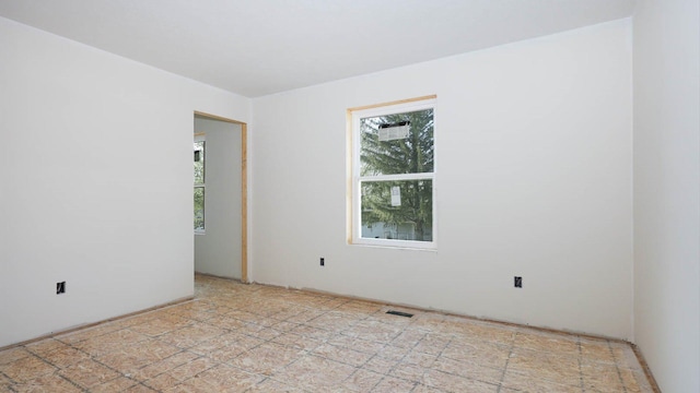 empty room featuring visible vents