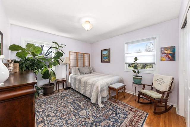 736 Willow Rd, Naperville, IL 60540 - bedroom with baseboards and wood finished floors