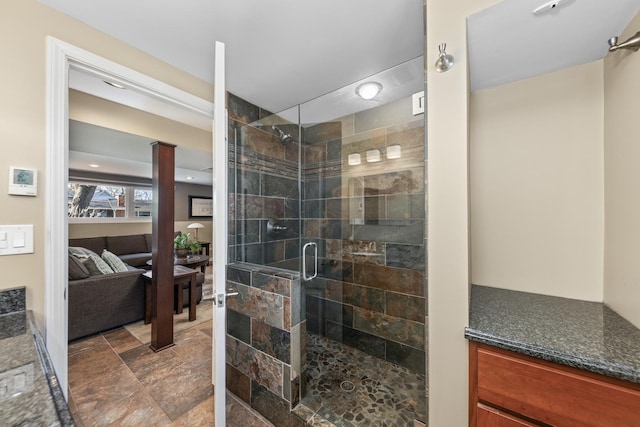 736 Willow Rd, Naperville, IL 60540 - bathroom featuring stone finish flooring and a stall shower