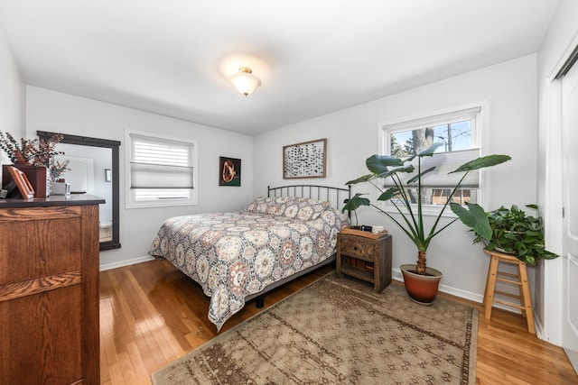 736 Willow Rd, Naperville, IL 60540 - bedroom with baseboards and wood-type flooring
