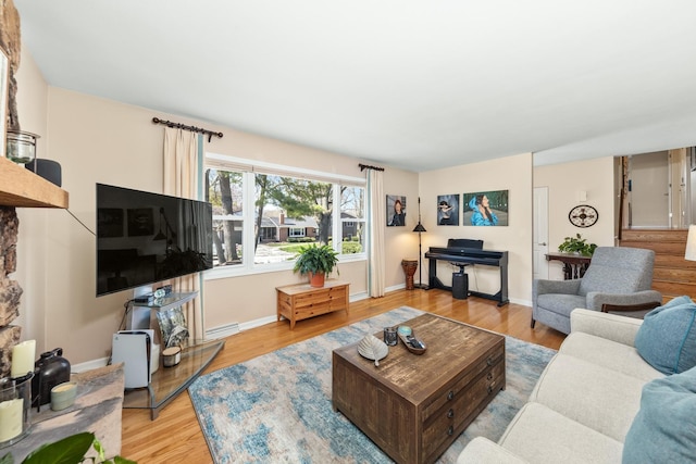 736 Willow Rd, Naperville, IL 60540 - living room with baseboards, light wood finished floors, and a baseboard radiator