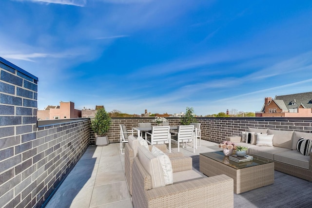 view of patio featuring outdoor dining area and outdoor lounge area
