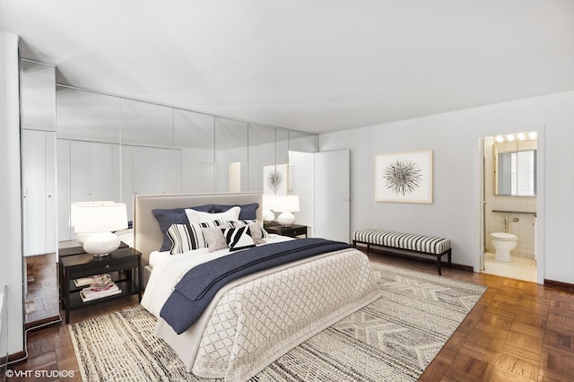 bedroom featuring ensuite bath